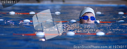 Image of .boy in swimming pool