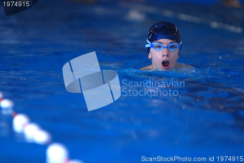 Image of .boy in swimming pool