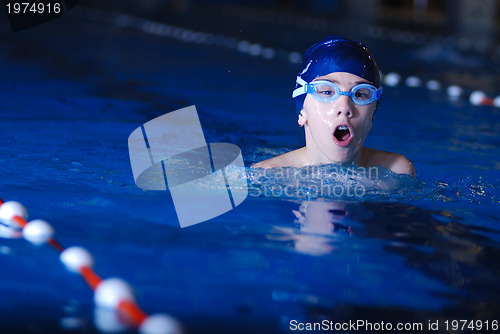 Image of .boy in swimming pool