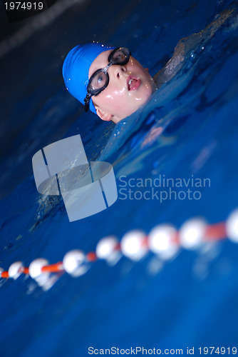 Image of .boy in swimming pool