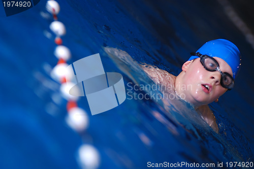 Image of .boy in swimming pool