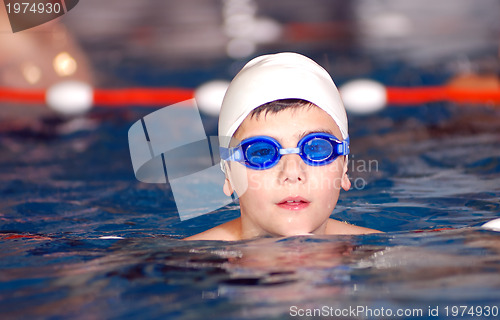 Image of .boy in swimming pool