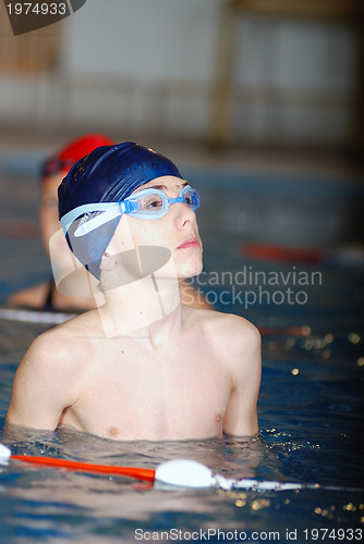 Image of .boy in swimming pool
