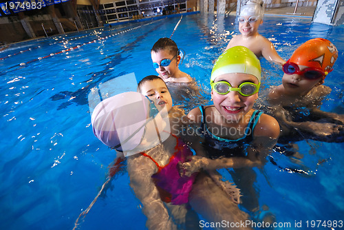 Image of .happy moments at swimming pool with smilling childrens
