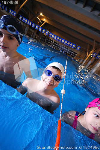 Image of .childrens in serie at swimming pool 