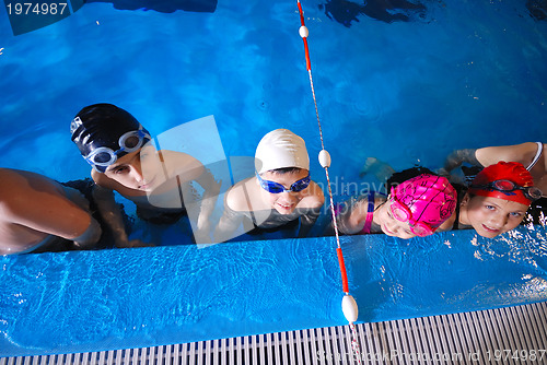 Image of .childrens in serie at swimming pool 