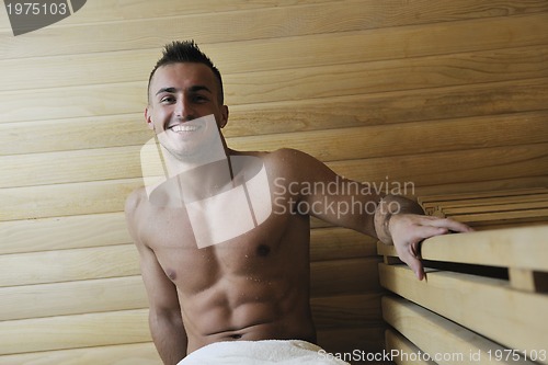 Image of attractive young man in sauna