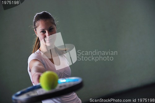Image of one young woman play tennis