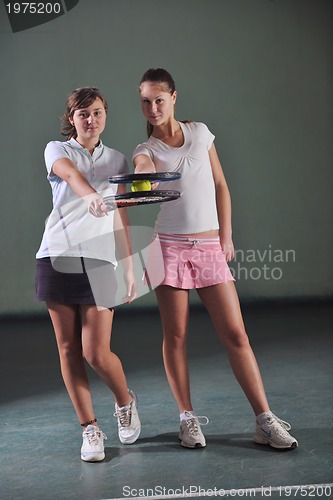 Image of two woman tennis