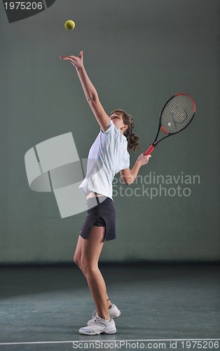 Image of one young woman play tennis