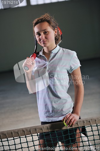 Image of one young woman play tennis