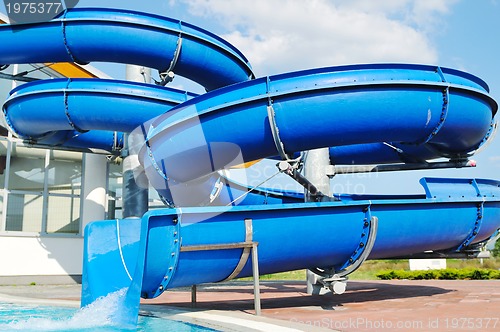 Image of water slide fun on outdoor pool