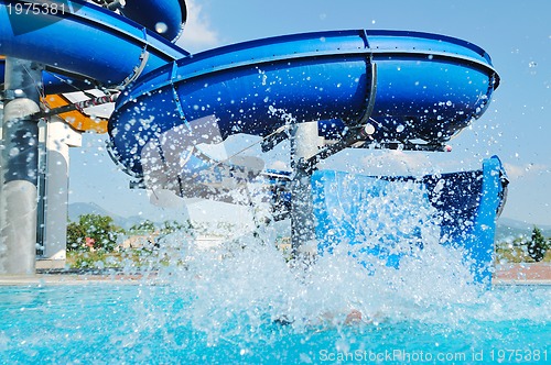 Image of water slide fun on outdoor pool