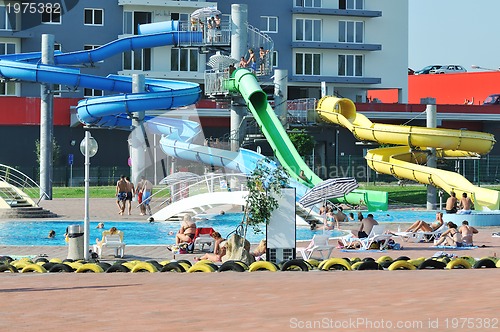 Image of water slide fun on outdoor pool