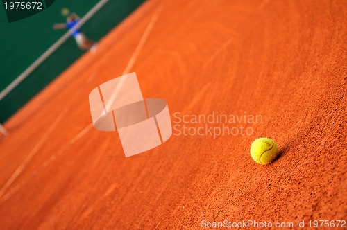 Image of One tennis ball  on court