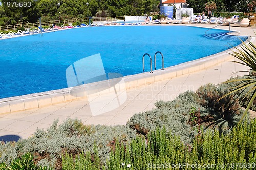 Image of Outdoor pool in nice hotel