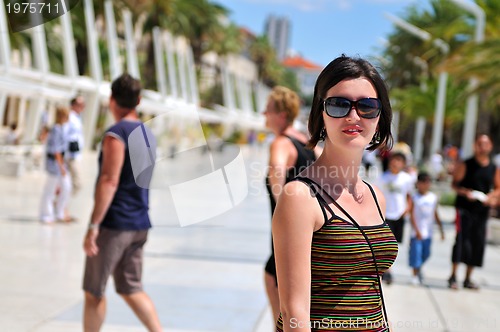 Image of Young pretty woman  on holiday