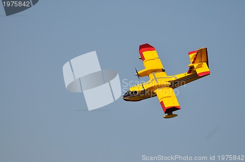 Image of Airplane on sea taking water