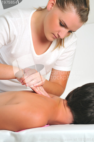 Image of back massage at the spa and wellness center