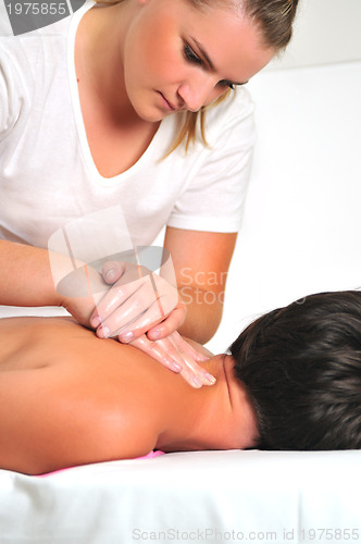 Image of back massage at the spa and wellness center