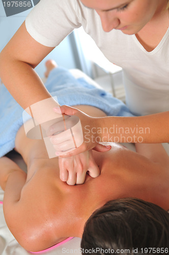 Image of back massage at the spa and wellness center