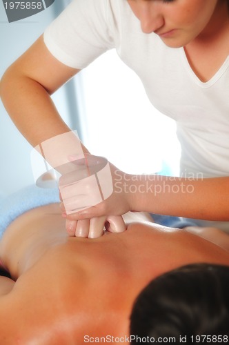 Image of back massage at the spa and wellness center