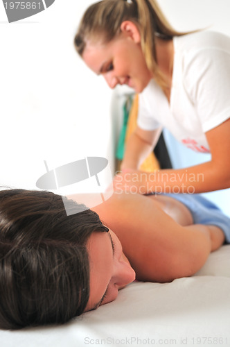 Image of back massage at the spa and wellness center