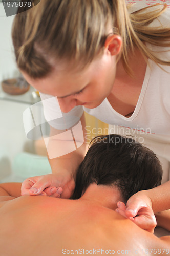 Image of back massage at the spa and wellness center