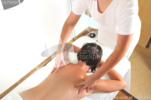 Image of back massage at the spa and wellness center