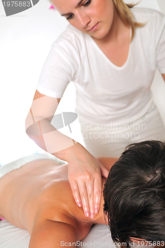 Image of back massage at the spa and wellness center