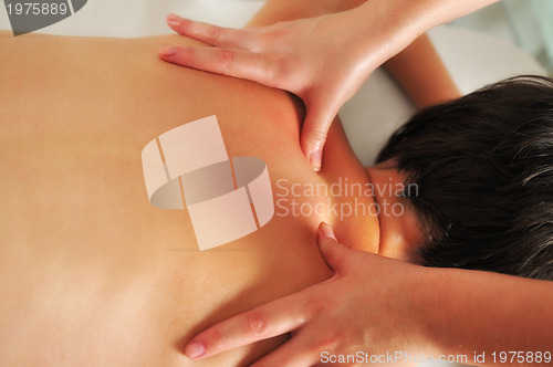 Image of back massage at the spa and wellness center