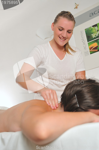 Image of back massage at the spa and wellness center
