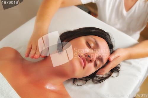 Image of beautiful woman have massage at spa and wellness center