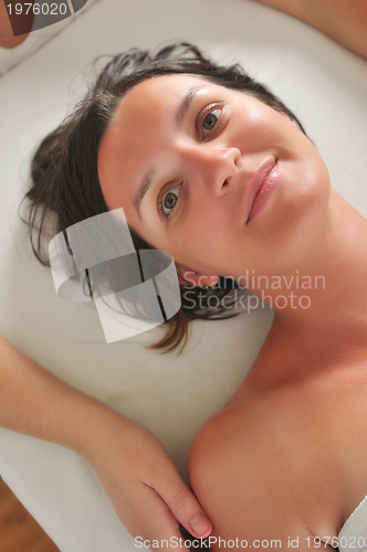 Image of beautiful woman have massage at spa and wellness center