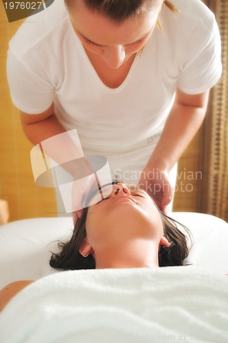 Image of beautiful woman have massage at spa and wellness center