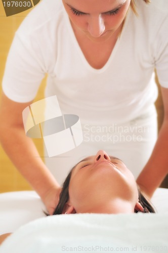 Image of beautiful woman have massage at spa and wellness center