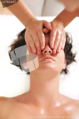 Image of beautiful woman have massage at spa and wellness center