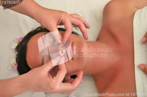 Image of beautiful woman have massage at spa and wellness center