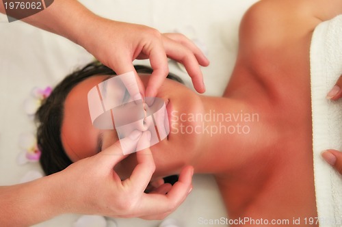 Image of beautiful woman have massage at spa and wellness center