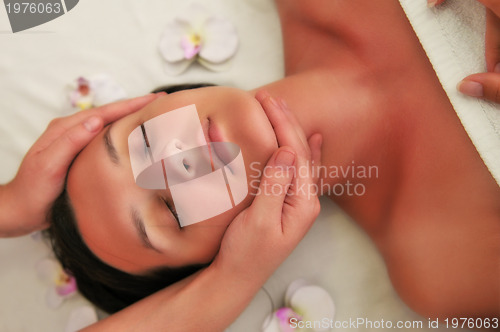 Image of beautiful woman have massage at spa and wellness center