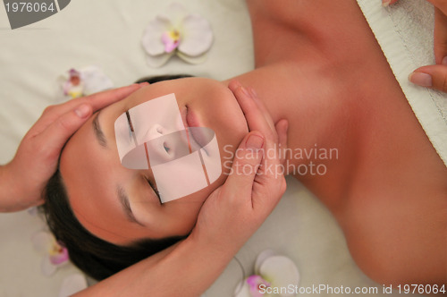 Image of beautiful woman have massage at spa and wellness center