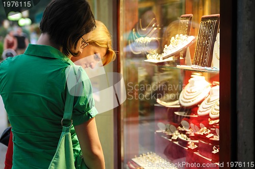 Image of Happy family mother and daughter shopping 