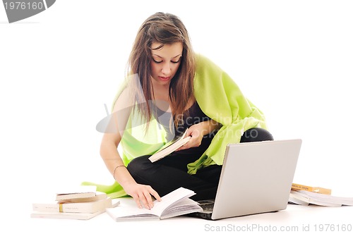 Image of one young girl work on laptop isolated on white