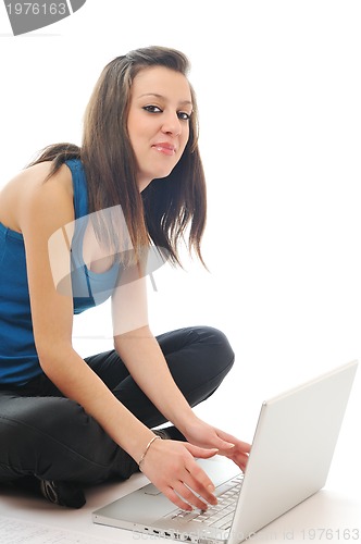 Image of one young girl work on laptop isolated on white