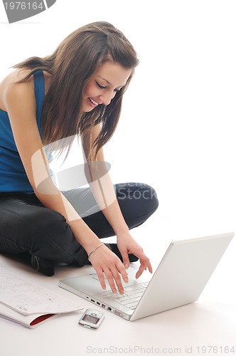 Image of one young girl work on laptop isolated on white