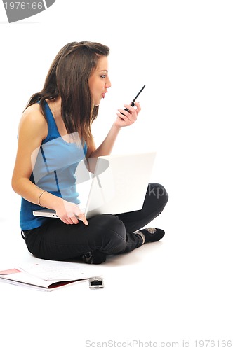 Image of one young girl work on laptop isolated on white