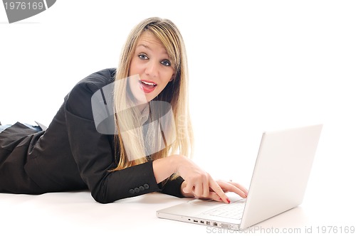 Image of one young girl work on laptop isolated on white