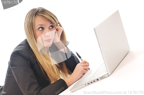 Image of one young girl work on laptop isolated on white