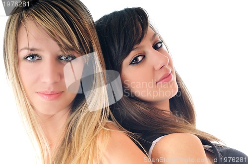 Image of two young girls isolated on white