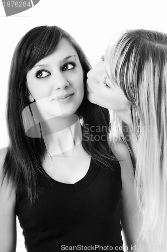 Image of two young girls isolated on white